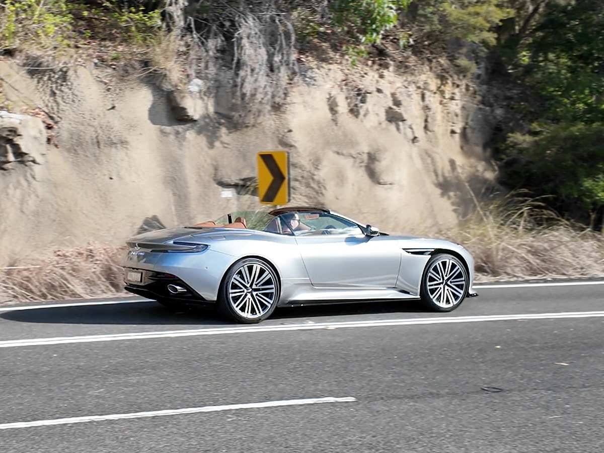 Aston martin db12 volante on road rear end