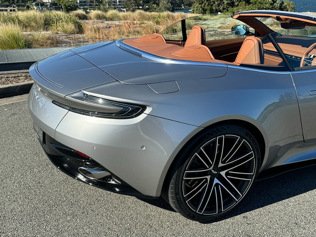 Aston martin db12 volante rear end roof down close up