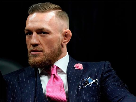 Conor mcgregor in his 'Fuck you’ pinstripe suit