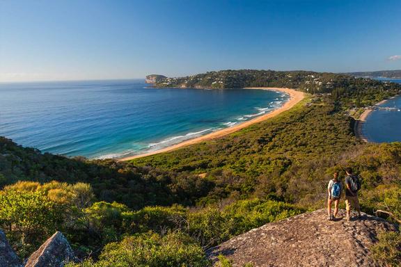 A man and a woman on Barrenjoey Lighthouse Walk