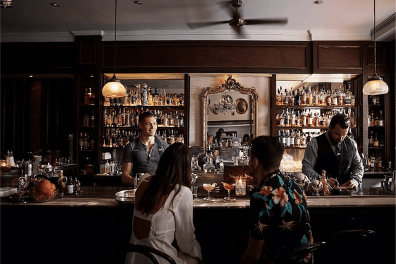 Man and a woman at a bar