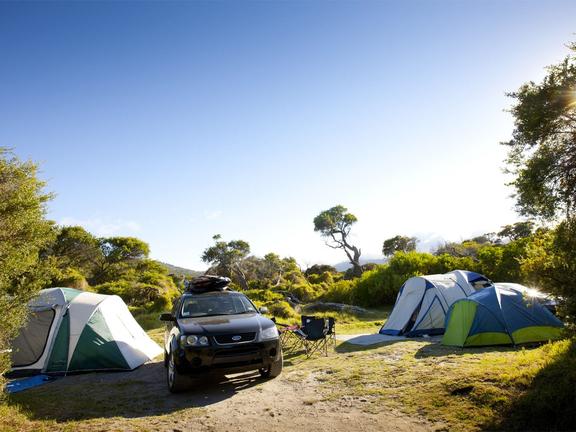 Car with tents around it