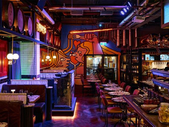 Interior of pub with colourful lights and decor