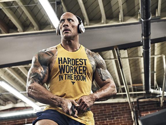 Medium shot of Dwayne ‘The Rock’ Johnson wearing headphones