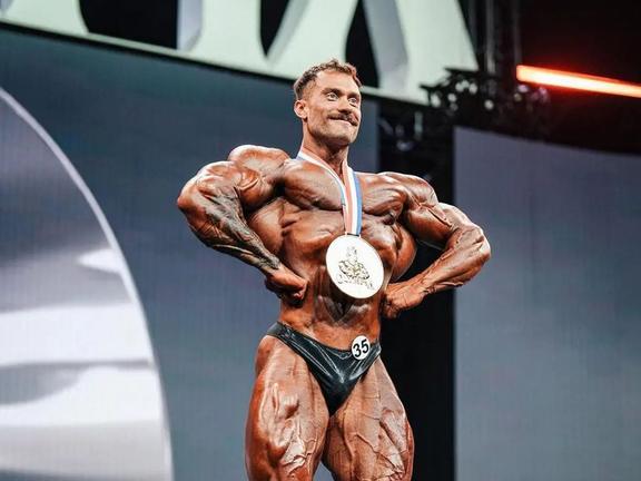 Chris Bumstead claiming his fifth consecutive Classic Physique Olympia title in Orlando | Image: Mrolympiallc/Instagram